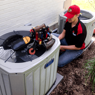 servicing an air conditioner